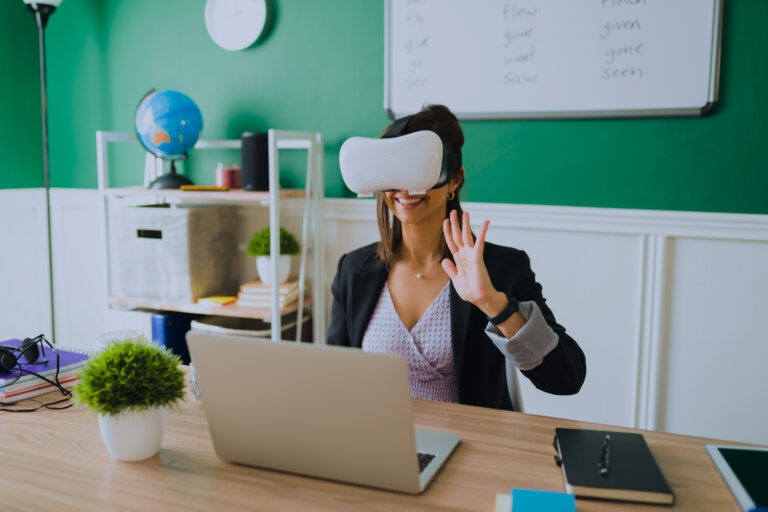 A young teacher wearing a VR headset, conducting an online lesson through virtual reality in a virtual classroom setting.